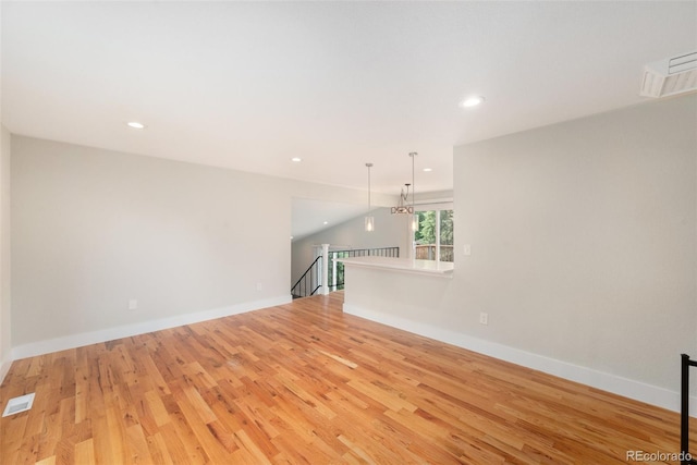 15908 E Flora Pl, Aurora, CO 80013 - spare room with light wood-style floors and recessed lighting