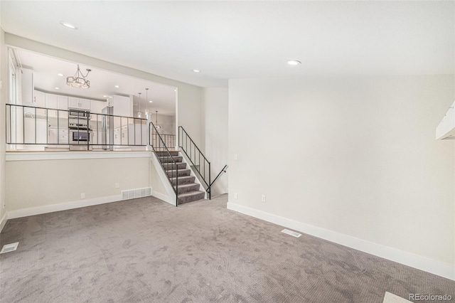 15908 E Flora Pl, Aurora, CO 80013 - empty room with light colored carpet and recessed lighting
