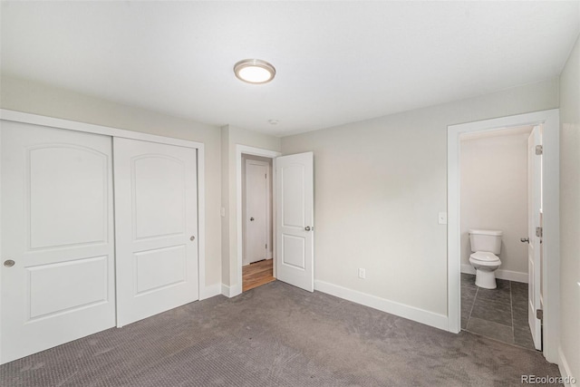 15908 E Flora Pl, Aurora, CO 80013 - unfurnished bedroom featuring carpet floors, a closet, and ensuite bath