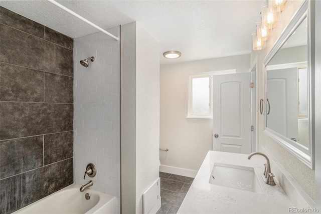 15908 E Flora Pl, Aurora, CO 80013 - full bath with tile patterned flooring, washtub / shower combination, vanity, and a textured ceiling