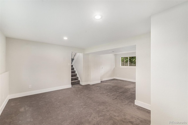 15908 E Flora Pl, Aurora, CO 80013 - unfurnished room with dark carpet, recessed lighting, and stairway