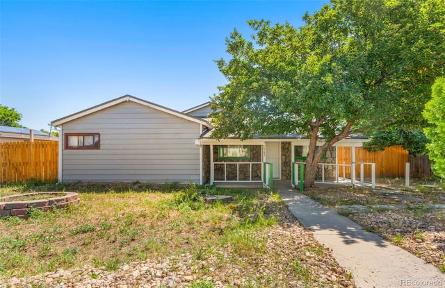 5942 Poplar St, Commerce City, CO 80022 - view of front facade with stone siding