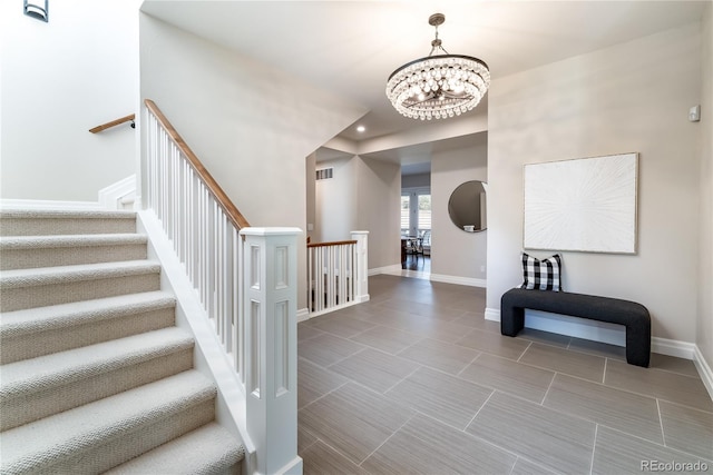 295 Jersey St, Denver, CO 80220 - interior space featuring an inviting chandelier, recessed lighting, baseboards, visible vents, and stairway