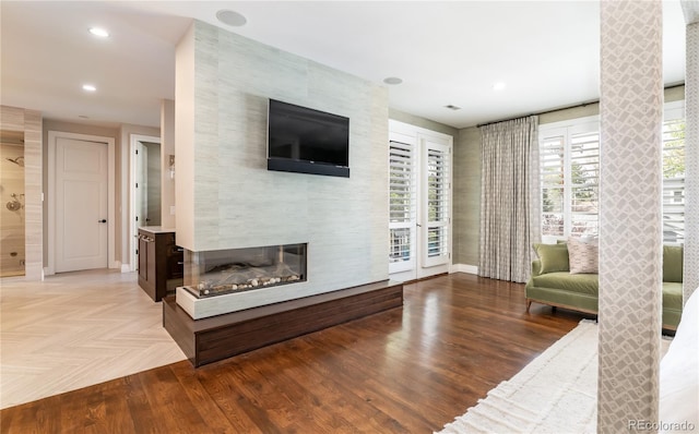 295 Jersey St, Denver, CO 80220 - living room with recessed lighting, baseboards, wood finished floors, and a premium fireplace