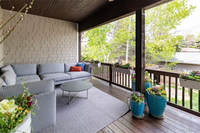 295 Jersey St, Denver, CO 80220 - wooden deck with an outdoor living space