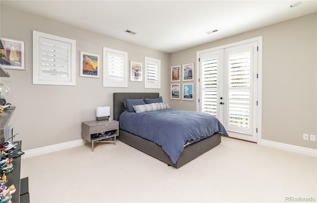 295 Jersey St, Denver, CO 80220 - bedroom featuring baseboards, carpet, access to exterior, and visible vents