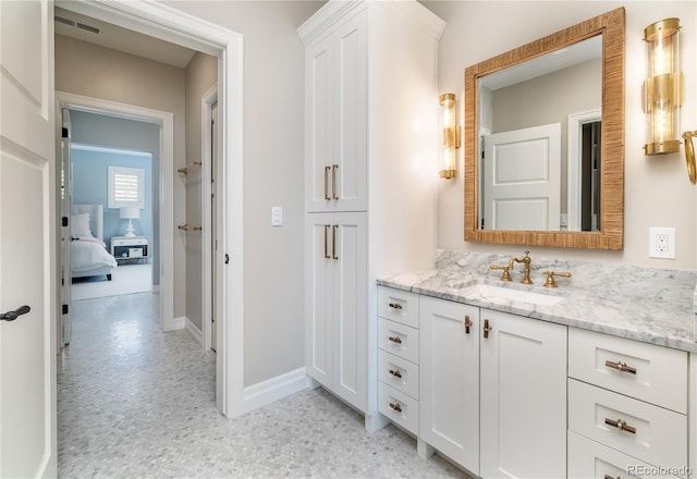 295 Jersey St, Denver, CO 80220 - bathroom featuring baseboards, vanity, connected bathroom, and visible vents