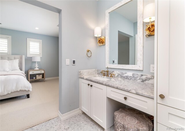 295 Jersey St, Denver, CO 80220 - bathroom with baseboards and vanity