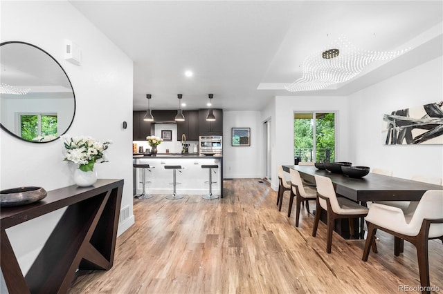 9161 W Lake Dr, Littleton, CO 80123 - dining space featuring light wood finished floors and recessed lighting