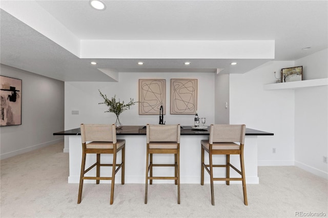 9161 W Lake Dr, Littleton, CO 80123 - dining space featuring light colored carpet and recessed lighting