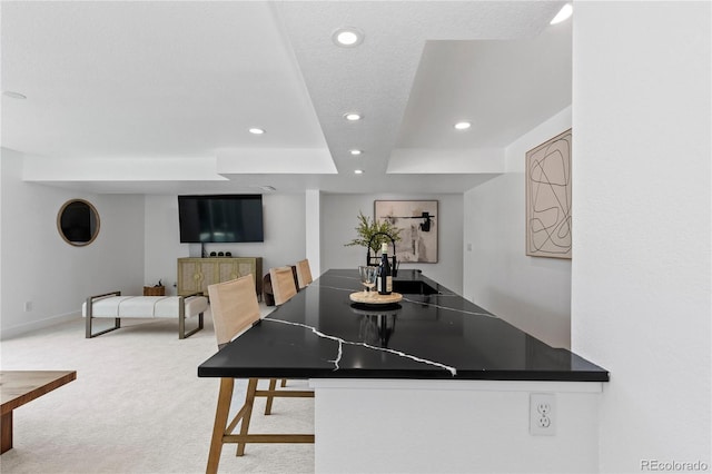 9161 W Lake Dr, Littleton, CO 80123 - dining area with carpet, recessed lighting, and a tray ceiling
