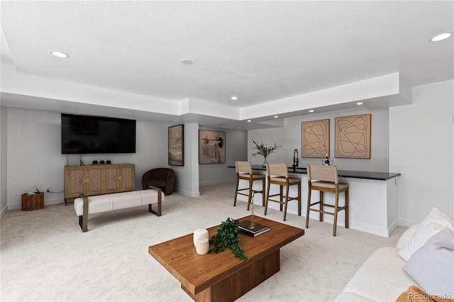 9161 W Lake Dr, Littleton, CO 80123 - carpeted living area featuring recessed lighting and bar with sink