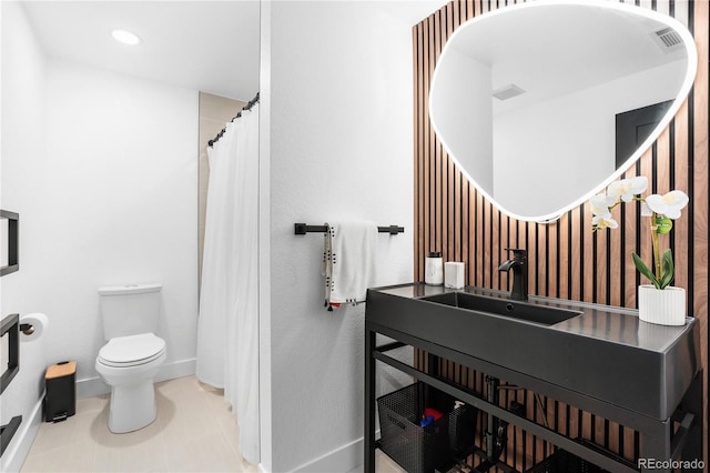 9161 W Lake Dr, Littleton, CO 80123 - bathroom featuring vanity, a shower with shower curtain, and tile patterned floors