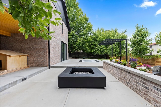 9161 W Lake Dr, Littleton, CO 80123 - fenced backyard with an outdoor fire pit, a patio area, and a pergola