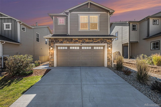 view of front of property with a garage