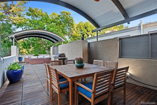 view of patio / terrace featuring grilling area, outdoor lounge area, outdoor dining area, and a deck