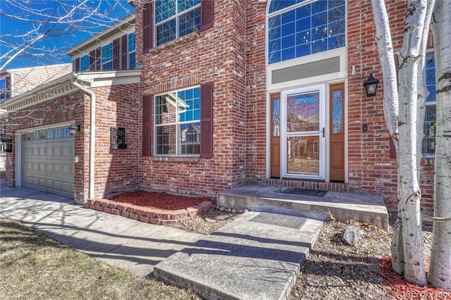 property entrance with brick siding