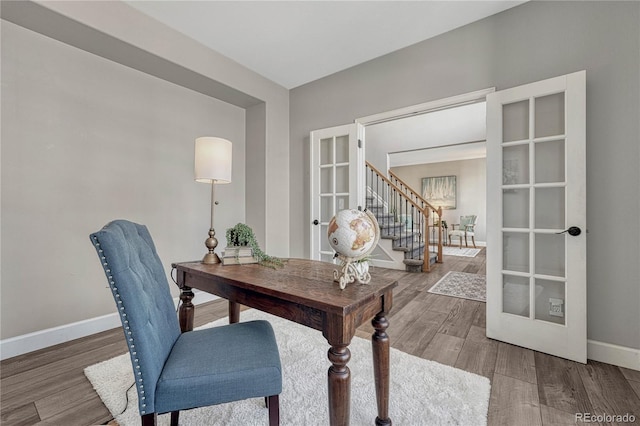 office area featuring french doors, wood finished floors, and baseboards