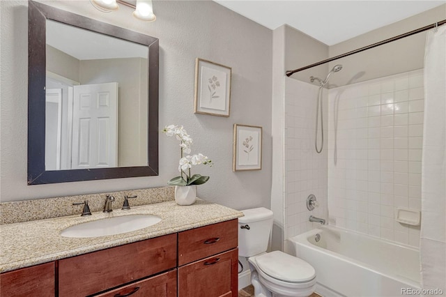 full bathroom featuring vanity, toilet, and shower / bathtub combination