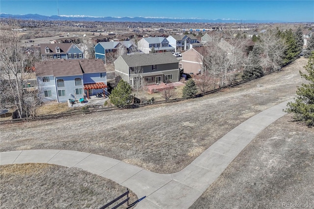 bird's eye view with a residential view and a mountain view