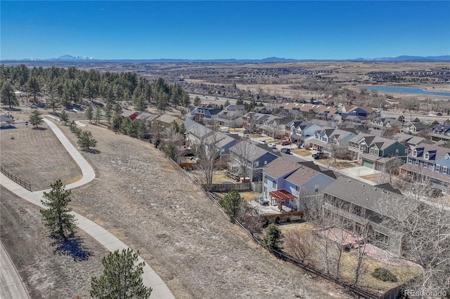 bird's eye view featuring a mountain view and a residential view