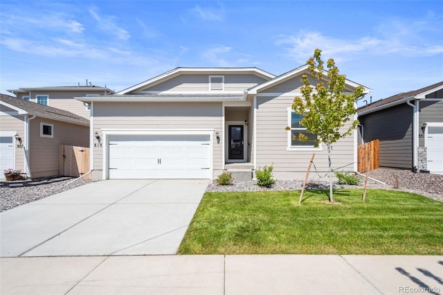 819 Sunflower Dr, Brighton, CO 80601 - view of front facade with concrete driveway and an attached garage
