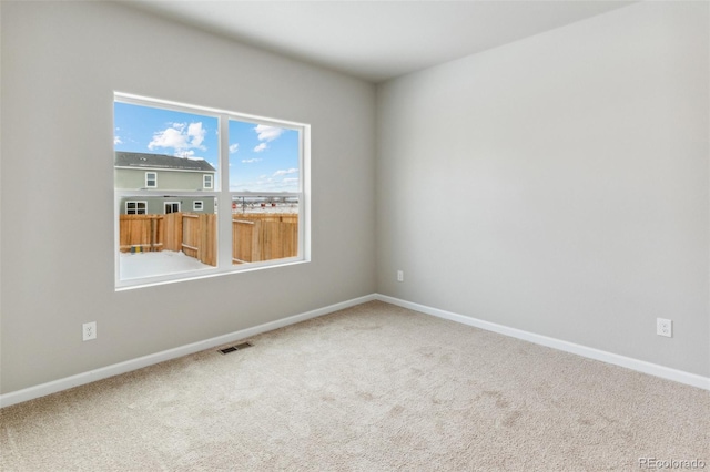 819 Sunflower Dr, Brighton, CO 80601 - unfurnished room featuring carpet and baseboards