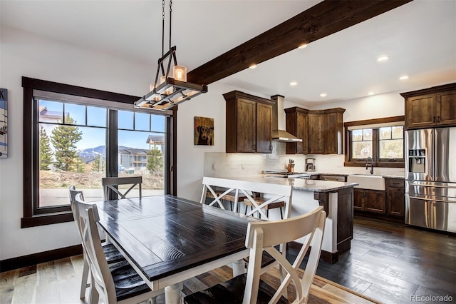 200 Quill, Fraser, CO 80442 - dining space with recessed lighting, dark wood-style flooring, beam ceiling, and baseboards
