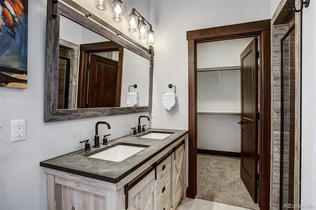 200 Quill, Fraser, CO 80442 - bathroom with a spacious closet and double vanity