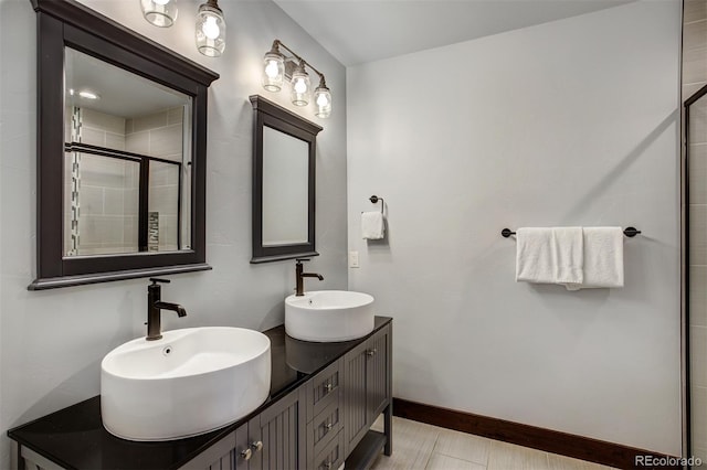 200 Quill, Fraser, CO 80442 - full bathroom with a stall shower, baseboards, and double vanity
