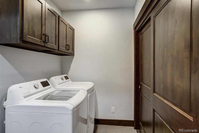 200 Quill, Fraser, CO 80442 - laundry area with washer and clothes dryer, cabinet space, and baseboards