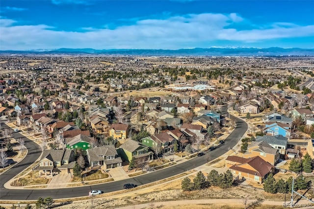 aerial view featuring a mountain view and a residential view