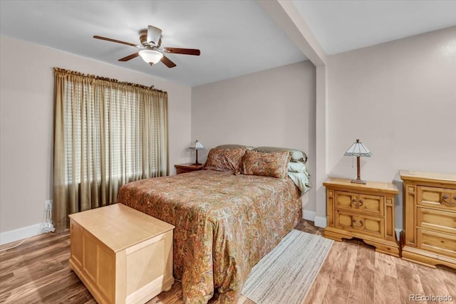 4694 S Ouray Way, Aurora, CO 80015 - bedroom featuring light wood-style floors, baseboards, and ceiling fan