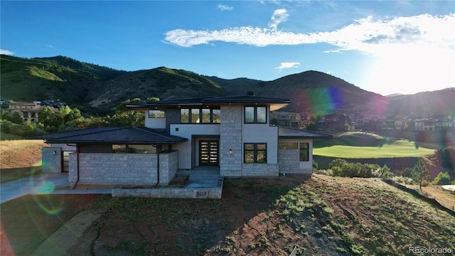 view of front of home with a mountain view