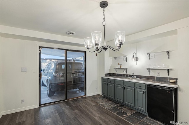 kitchen featuring gray cabinetry, sink, hanging light fixtures, an inviting chandelier, and fridge