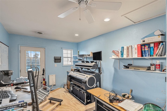 interior space featuring ceiling fan