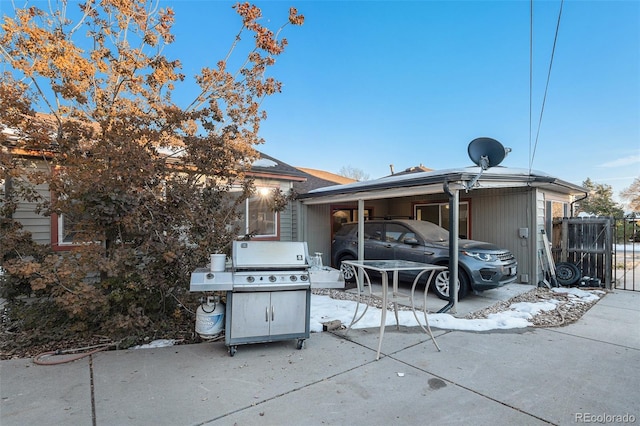 exterior space with a carport