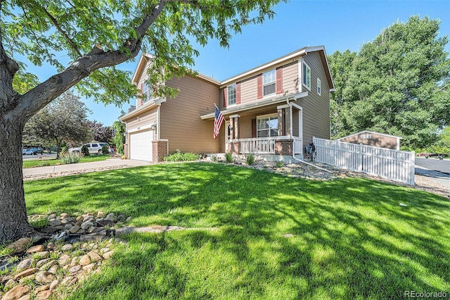 10289 Dresden St, Firestone, CO 80504 - view of front of house with a porch, driveway, and a garage