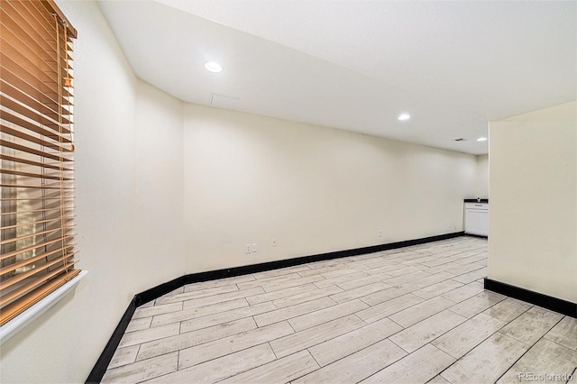 10289 Dresden St, Firestone, CO 80504 - empty room featuring light wood-style floors, recessed lighting, and baseboards