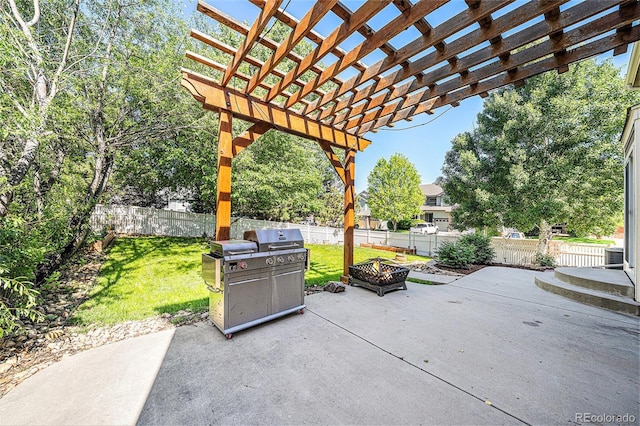 10289 Dresden St, Firestone, CO 80504 - view of patio / terrace with an outdoor fire pit and a pergola