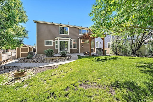 10289 Dresden St, Firestone, CO 80504 - back of house with a patio, a pergola, and an outdoor fire pit