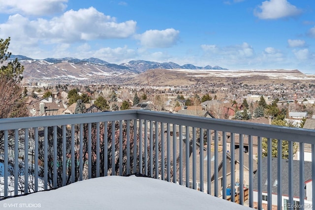 balcony featuring a mountain view