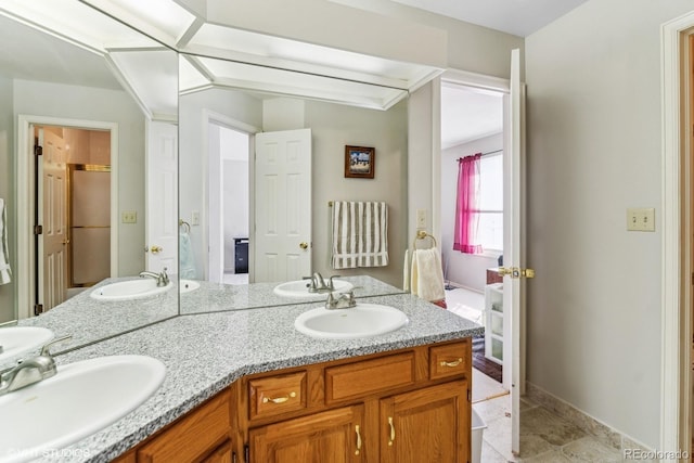 full bath featuring double vanity and a sink