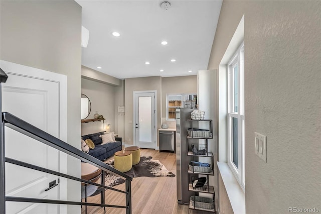 3219 W 19th Ave Unit 4, Denver, CO 80204 - living room featuring wood finished floors and recessed lighting