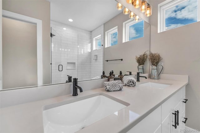 3219 W 19th Ave Unit 4, Denver, CO 80204 - full bath featuring healthy amount of natural light, double vanity, a shower stall, and recessed lighting