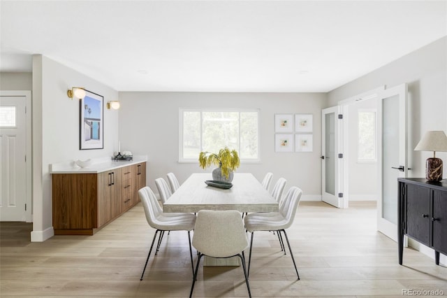 11762 W 34th Ave, Wheat Ridge, CO 80033 - dining space with light wood finished floors and baseboards