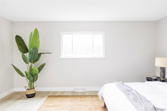 11762 W 34th Ave, Wheat Ridge, CO 80033 - bedroom featuring wood finished floors and baseboards