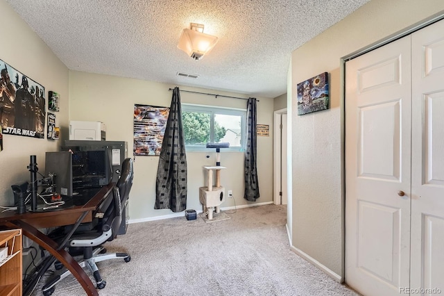 19196 E Kansas Dr, Aurora, CO 80017 - carpeted home office with a textured ceiling