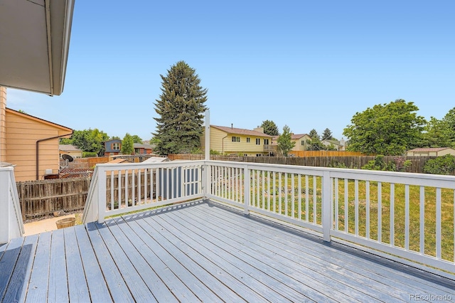 19196 E Kansas Dr, Aurora, CO 80017 - wooden terrace featuring a fenced backyard and a residential view