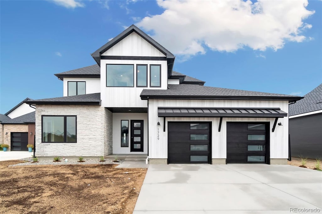 view of front of home with a garage